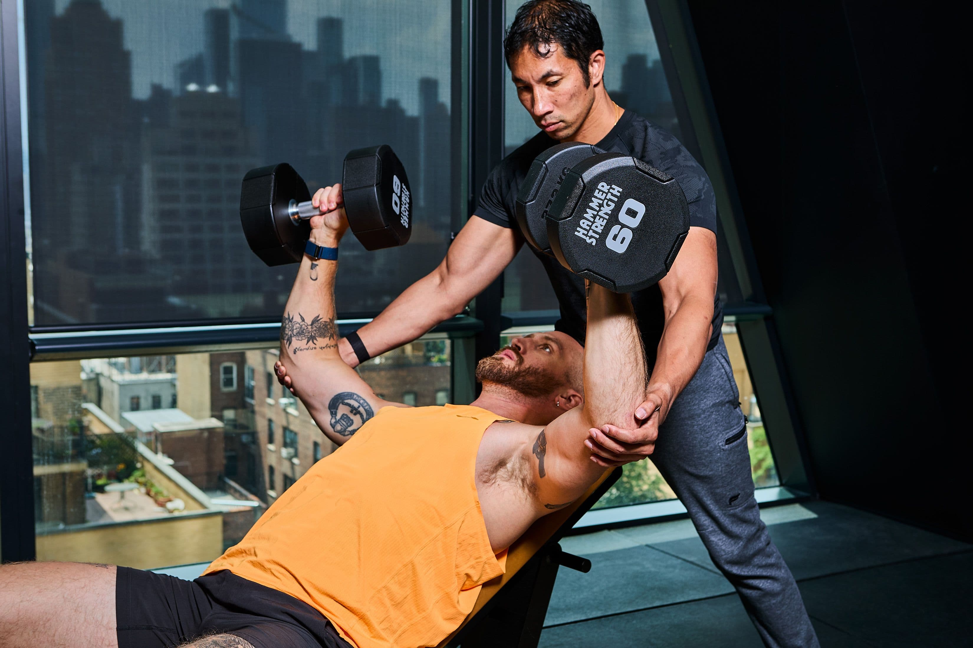 How You Should Actually Spot Upper Body Lifts