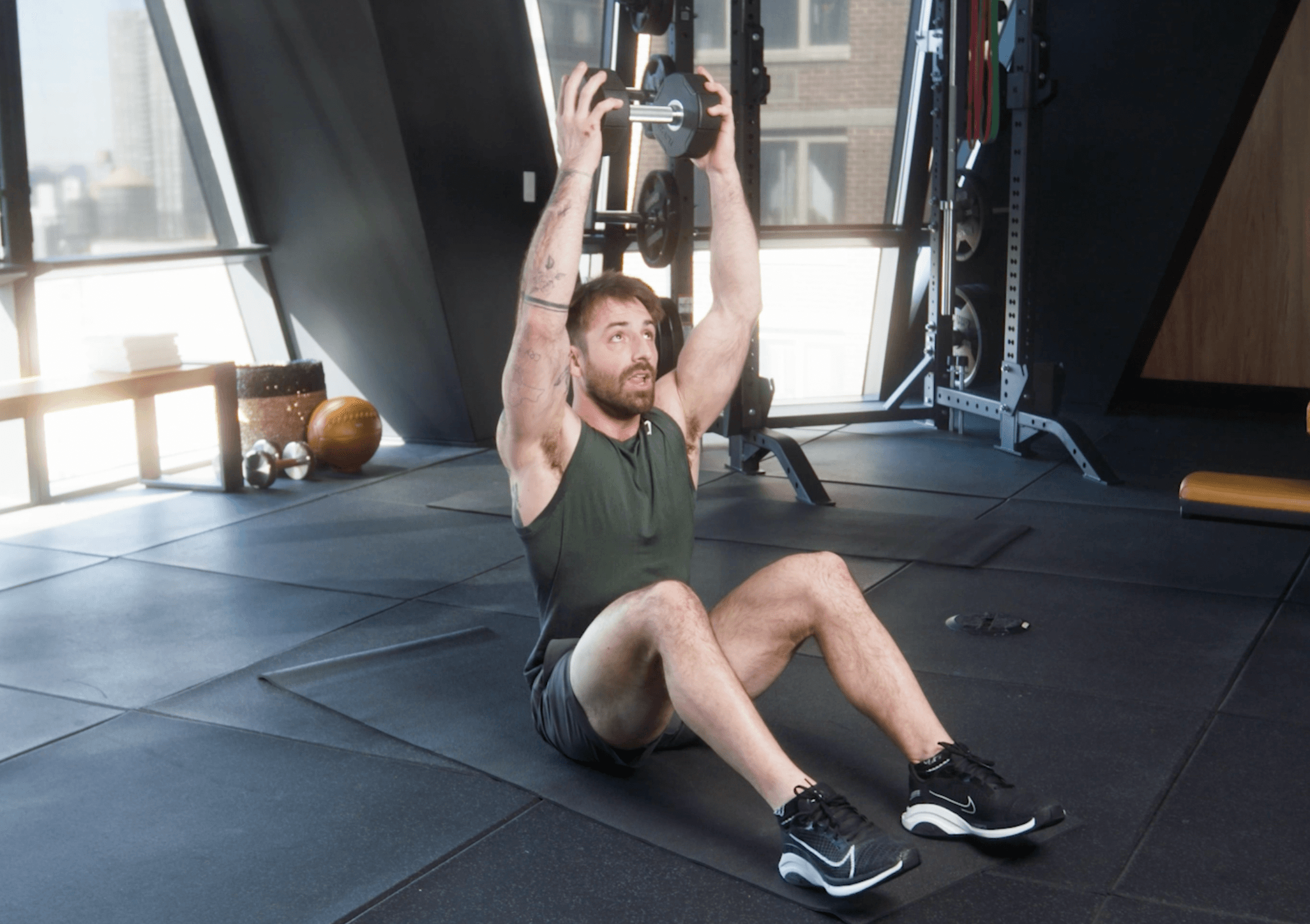 This Ultimate Abs Exercise Upgrades Your Core Workout With a Dumbbell
