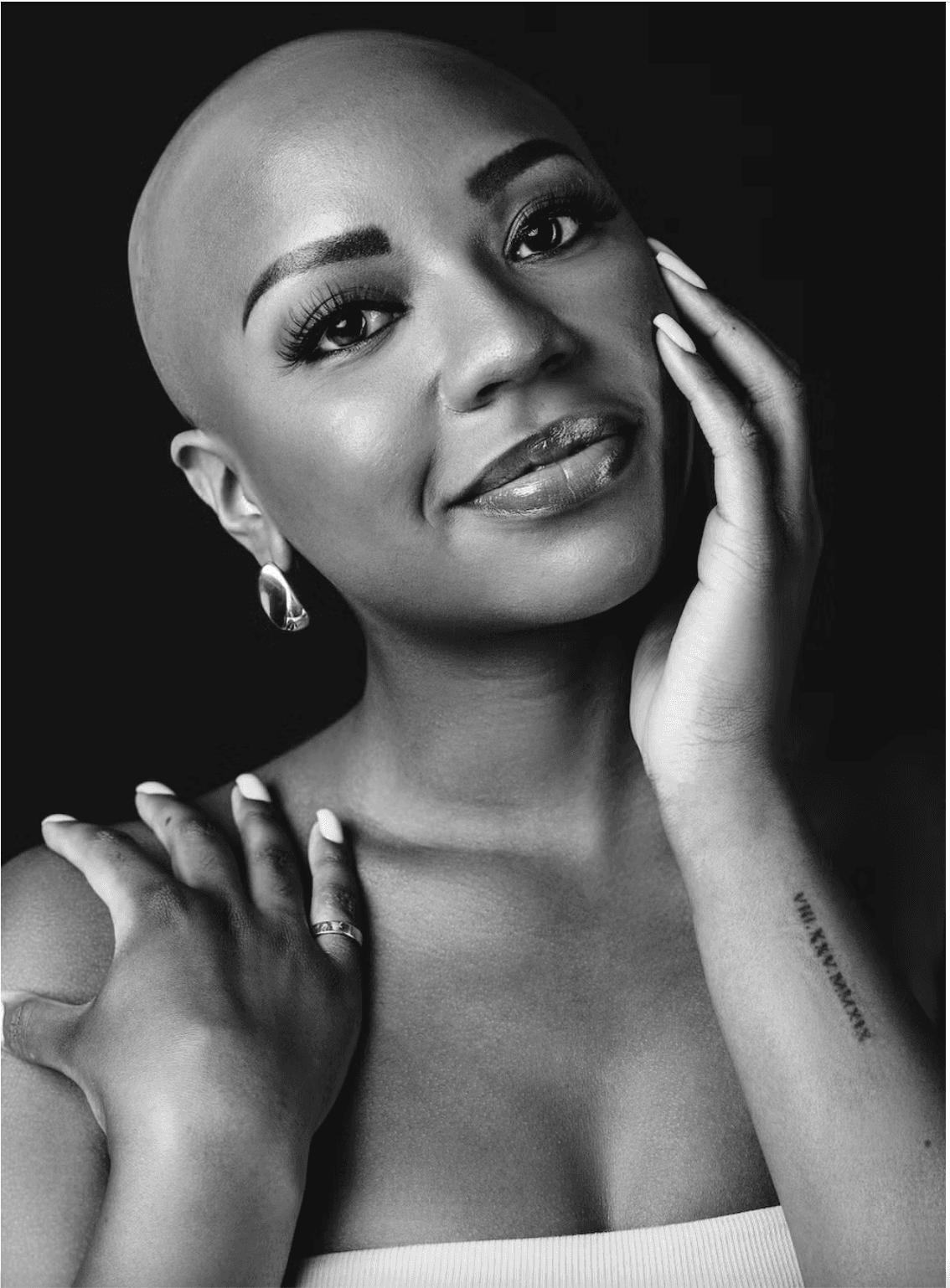 Dallas Cowboys Cheerleader Armani Latimer: "Why I Chose To Perform Without My Wig"