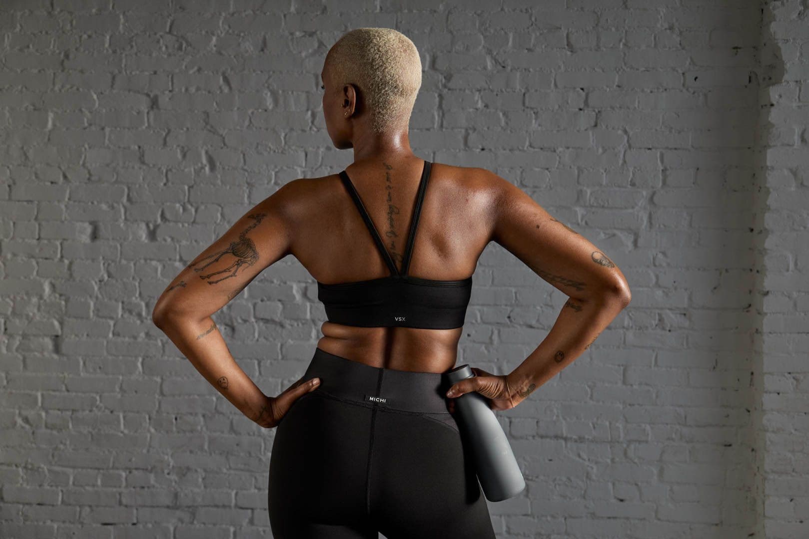 How To Get Rid Of Back Fat And Build Muscle, According To Experts