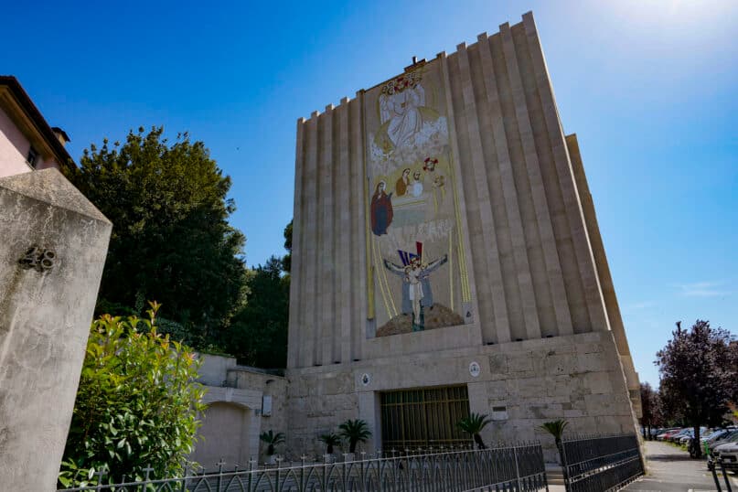 Mosaics by an artist accused of abusing women will stay on the Lourdes shrine, for now
