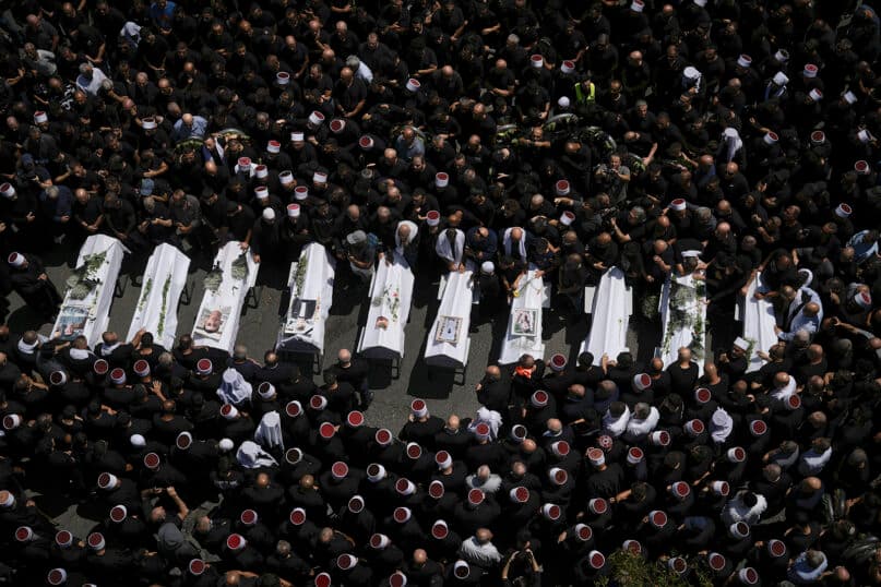 Who are the Druze? The Arab minority in Israel mourning children killed by rockets
