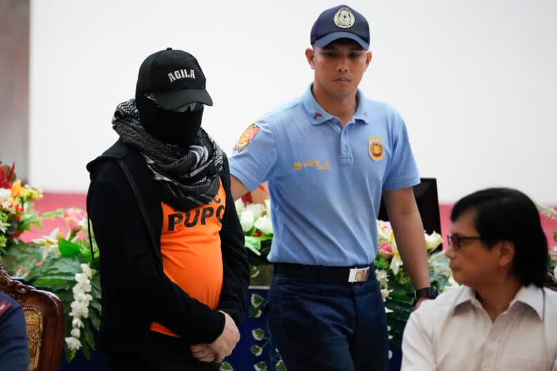 A Filipino preacher on the run from sexual abuse charges surrenders